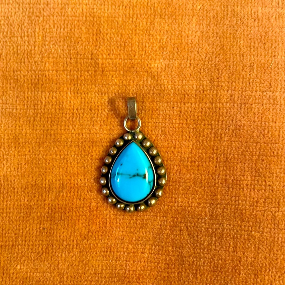 Sterling silver and turquoise charm